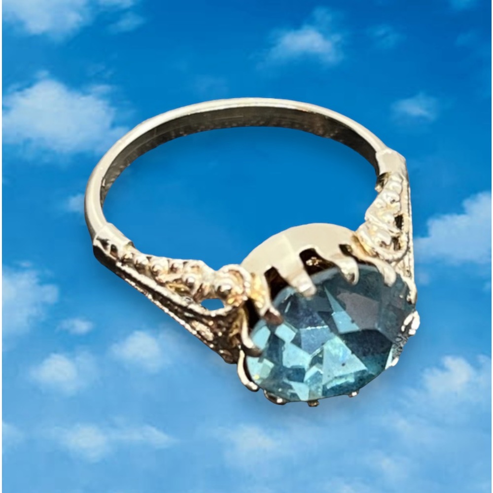 Vintage Germany Ornate Gold Tone Ring with Sparking Pale Blue Stone